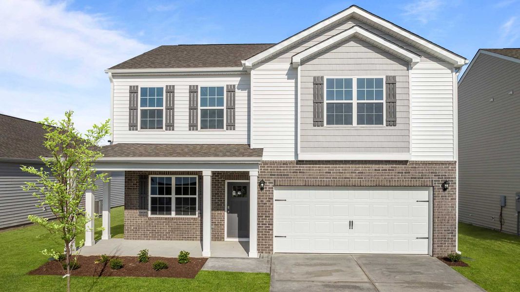 Front exterior of a home in the Ridgewood Farms community, located in Winterville, NC (Image 13).