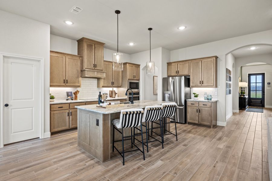 Furnished interior in a model home at Mockingbird Hills - Signature Series in Joshua (Image 12).