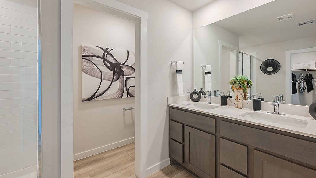 Furnished interior in a model home at Midtown Reserve in College Station (Image 17).