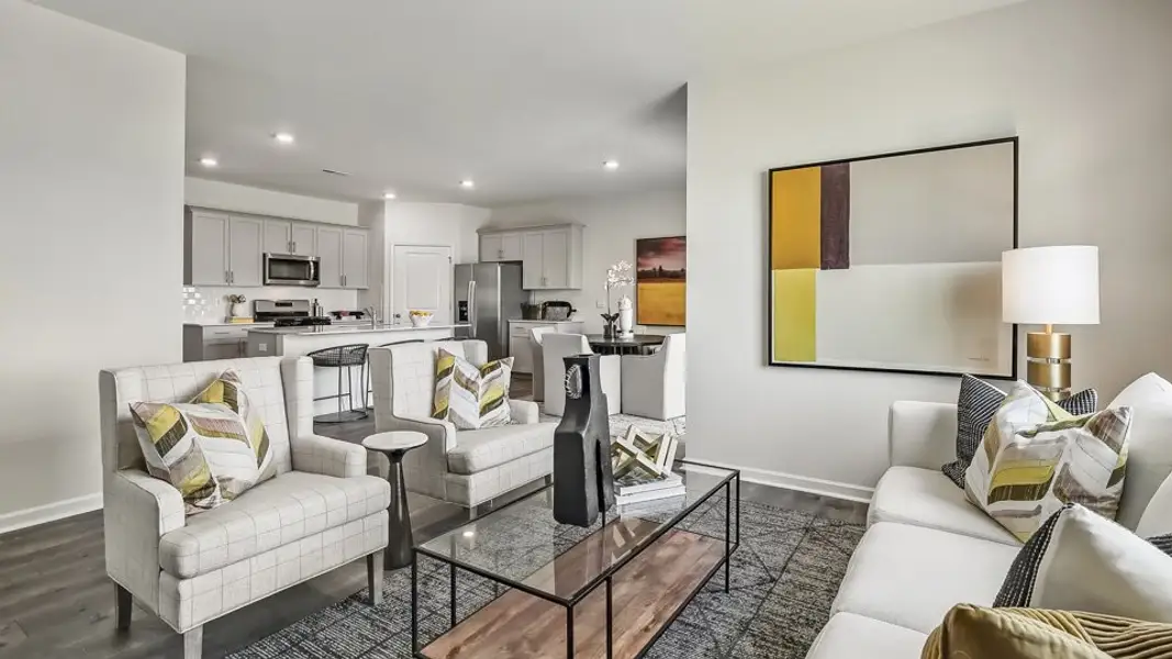 Furnished interior in a model home at The Landing at Winston Pointe in Clayton (Image 4). Furnished interior in a model home at The Landing at Winston Pointe in Clayton (Image 4).