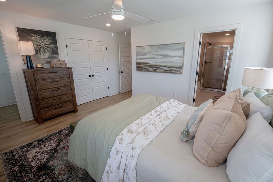 Furnished interior in a model home at The Townhomes at Union Depot in Bartlett (Image 24).