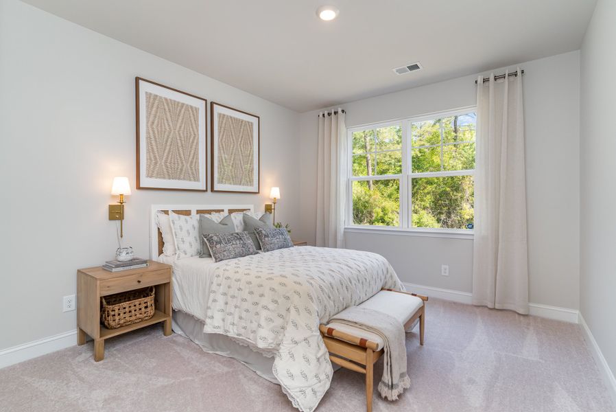 Furnished interior in a model home at Waterbridge in Myrtle Beach (Image 70).