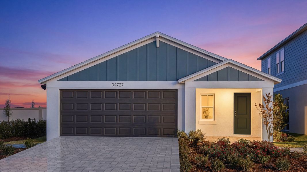 Front exterior of a home in the Pasadena Ridge community, located in Dade City, FL (Image 3).