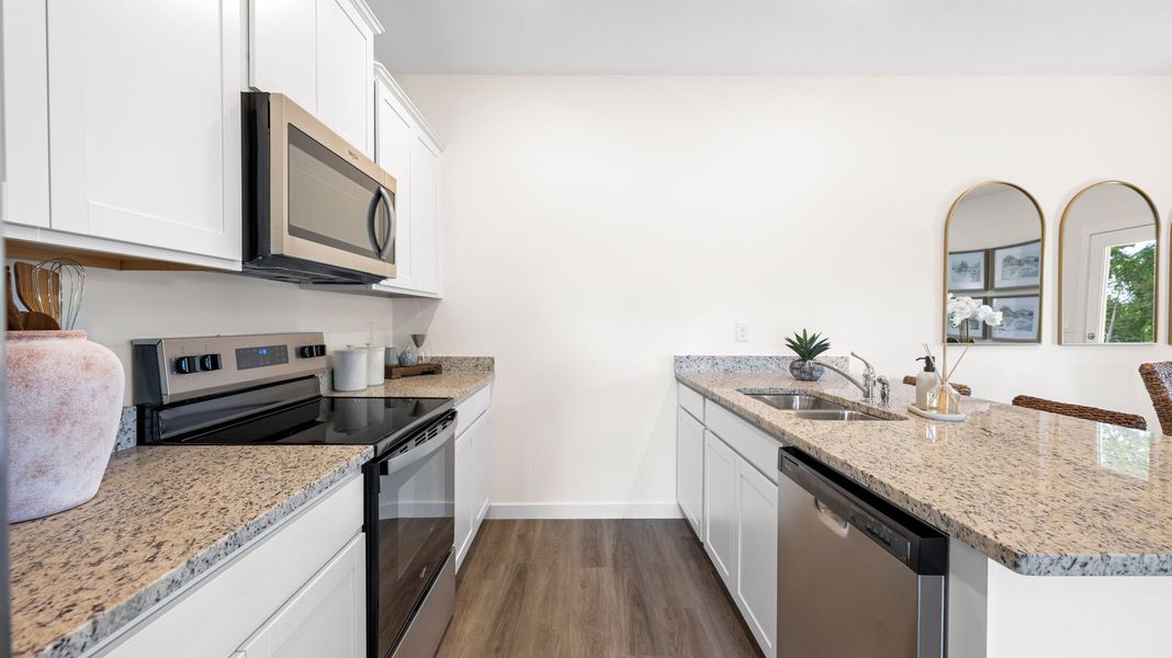 Furnished interior in a model home at Belcourt Landing in Cleveland (Image 7).
