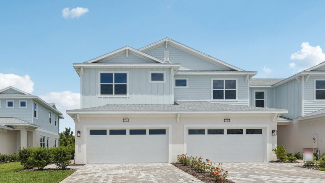Front exterior of a home in the Lagoon Residences at Epperson community, located in Wesley Chapel, FL (Image 2).