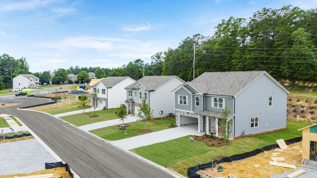 Front exterior of a home in the Northwoods at Mirror Lake community, located in Villa Rica, GA (Image 14).