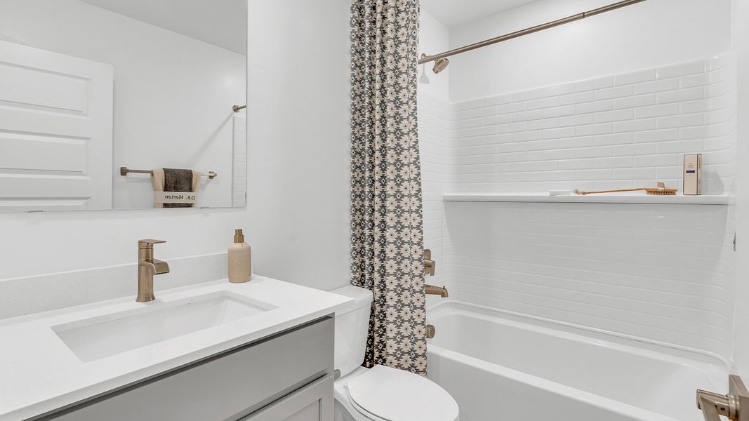 Furnished interior in a model home at Coronet at Gladden Farms in Marana (Image 86).