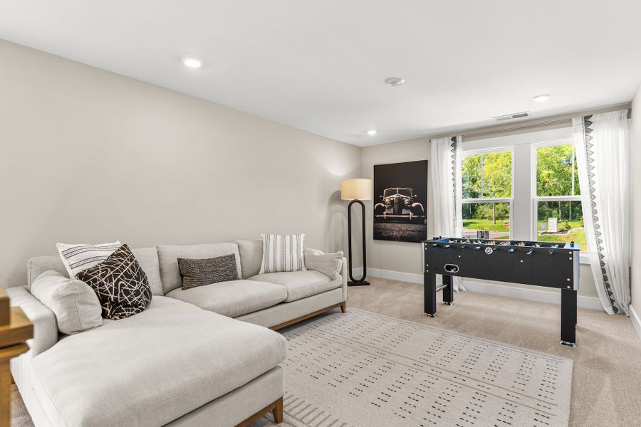 Furnished interior in a model home at Eagle Creek in Central (Image 15).