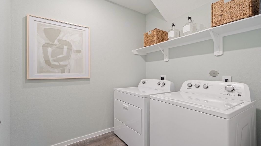 Furnished interior in a model home at Sunterra Lakes in Brookshire (Image 25).