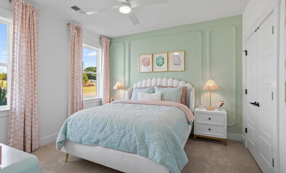 Furnished interior in a model home at The Enclave at Hidden Lake - 55+ Community in Youngsville (Image 17).