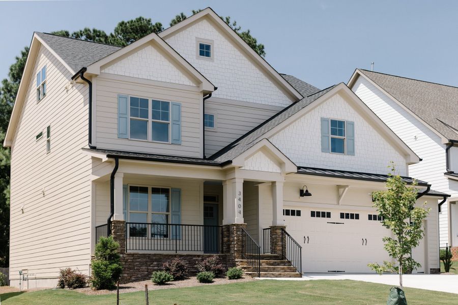 Front exterior of a home in the Forest Bluff Estates community, located in Fuquay Varina, NC (Image 16). Front exterior of a home in the Forest Bluff Estates community, located in Fuquay Varina, NC (Image 16).