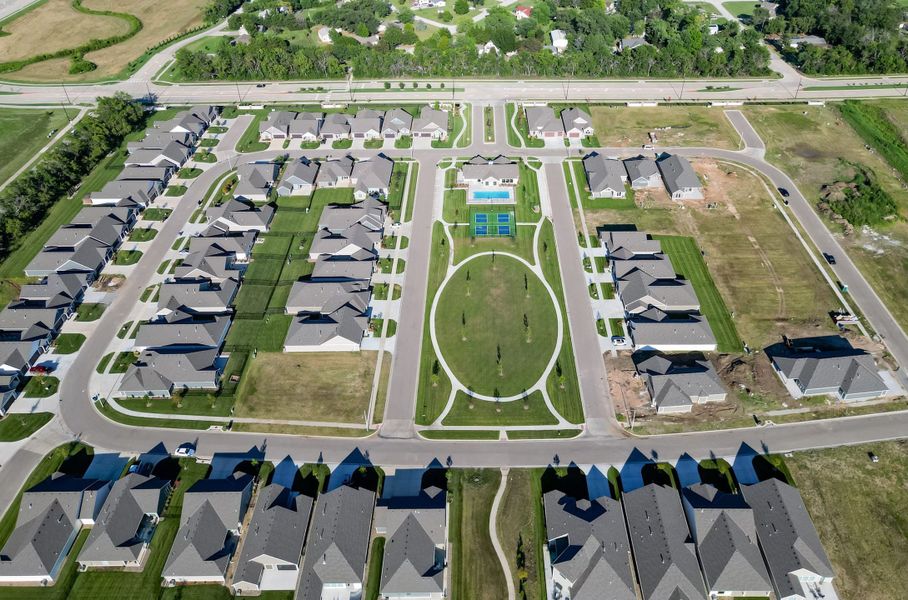 Aerial view of the The Courtyards at The Heritage community in Andover, KS, showing layout and nearby surroundings (Image 26). Aerial view of the The Courtyards at The Heritage community in Andover, KS, showing layout and nearby surroundings (Image 26).