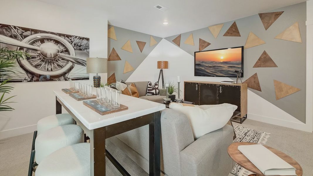 Furnished interior in a model home at Westerly in Erie (Image 22).