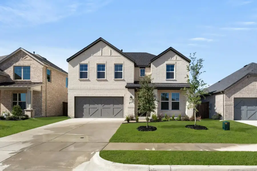 Front exterior of a home in the Discovery 50s community, located in Midlothian, TX (Image 3). Front exterior of a home in the Discovery 50s community, located in Midlothian, TX (Image 3).