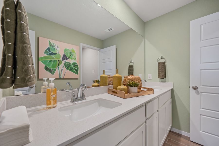 Furnished interior in a model home at Hunters Ranch in San Antonio (Image 27).