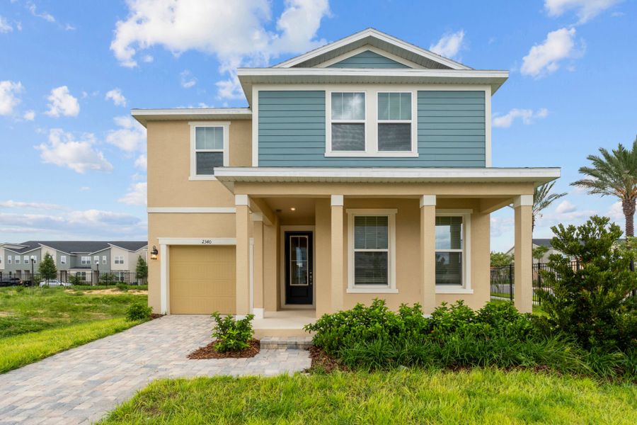 Front exterior of a home in the Solara Resort community, located in Kissimmee, FL (Image 4).