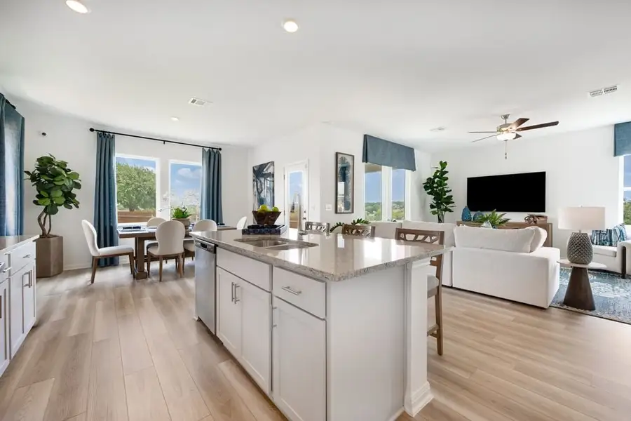 Furnished interior in a model home at Stonewall Ranch 40s in Liberty Hill (Image 30).