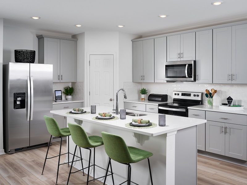 Kitchen in Hibiscus floorplan modeled at Lawson Dunes