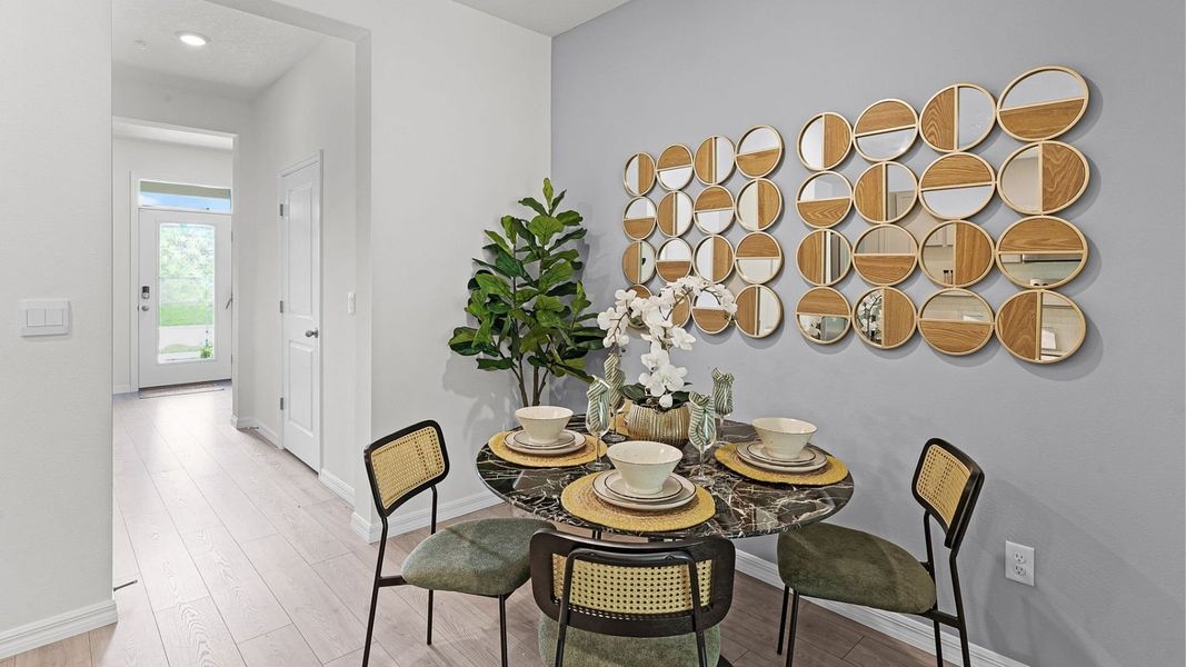 Furnished interior in a model home at Fish Lake Cove in Kissimmee (Image 19).