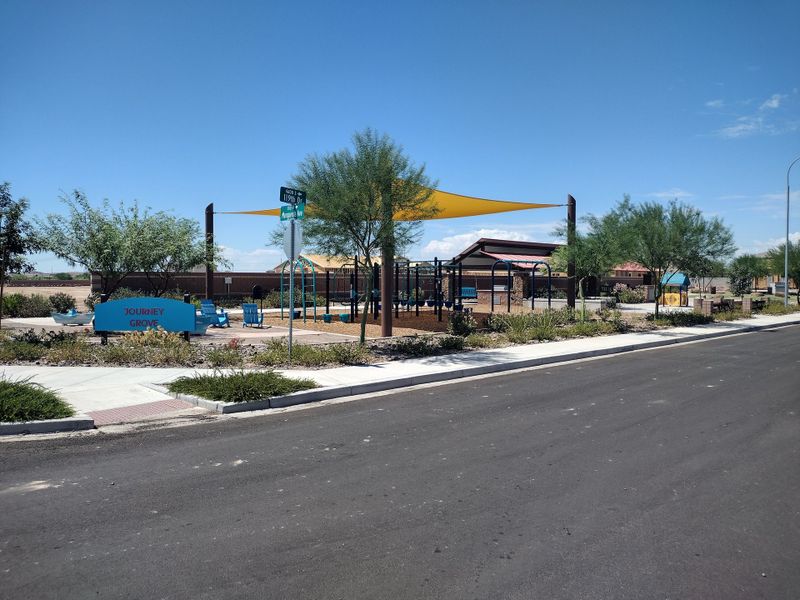 A vibrant community park with play areas and seating in Bridle Park at Alamar by Richmond American Homes (Avondale, AZ). A vibrant community park with play areas and seating in Bridle Park at Alamar by Richmond American Homes (Avondale, AZ).