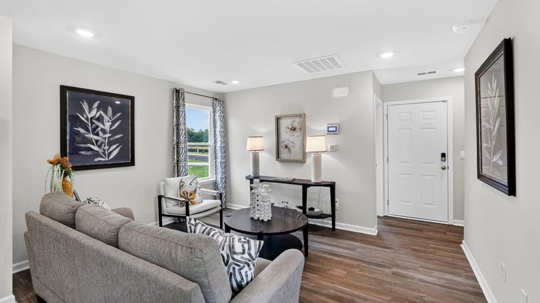 Furnished interior in a model home at Village 3 in Woodruff (Image 7). Furnished interior in a model home at Village 3 in Woodruff (Image 7).