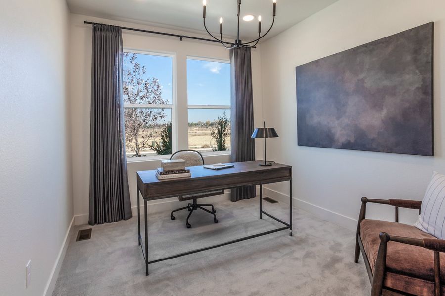 Furnished interior in a model home at Prairie Song in Windsor (Image 32).