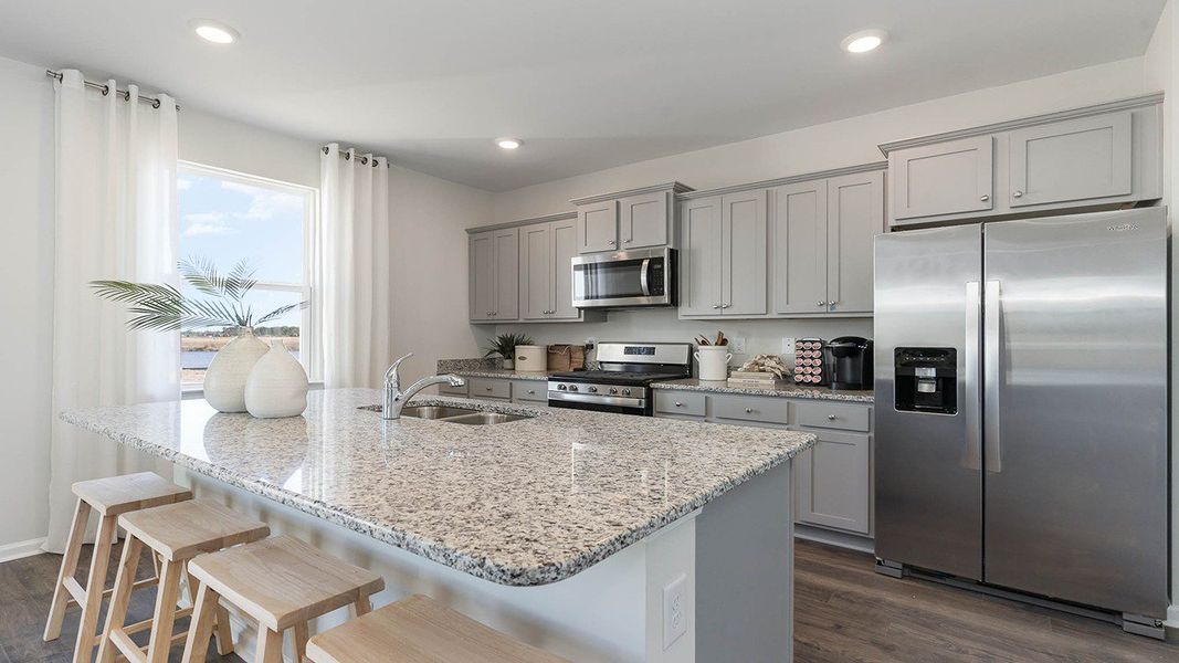 Furnished interior in a model home at South Island landing in Georgetown (Image 17).