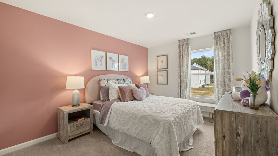 Furnished interior in a model home at Oakchase at Hampton in Hampton (Image 25).