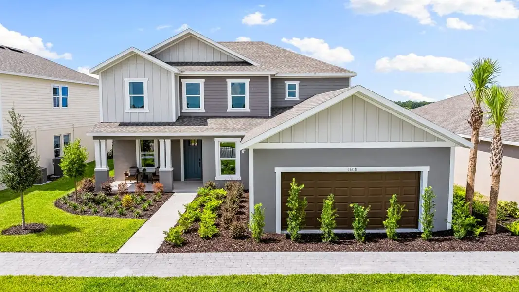 Front exterior of a home in the Firethorn community, located in Parrish, FL (Image 11).