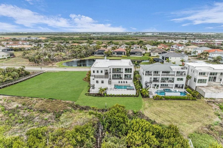 Aerial view of the Legends Bay community in Bradenton, FL, showing layout and nearby surroundings (Image 18).