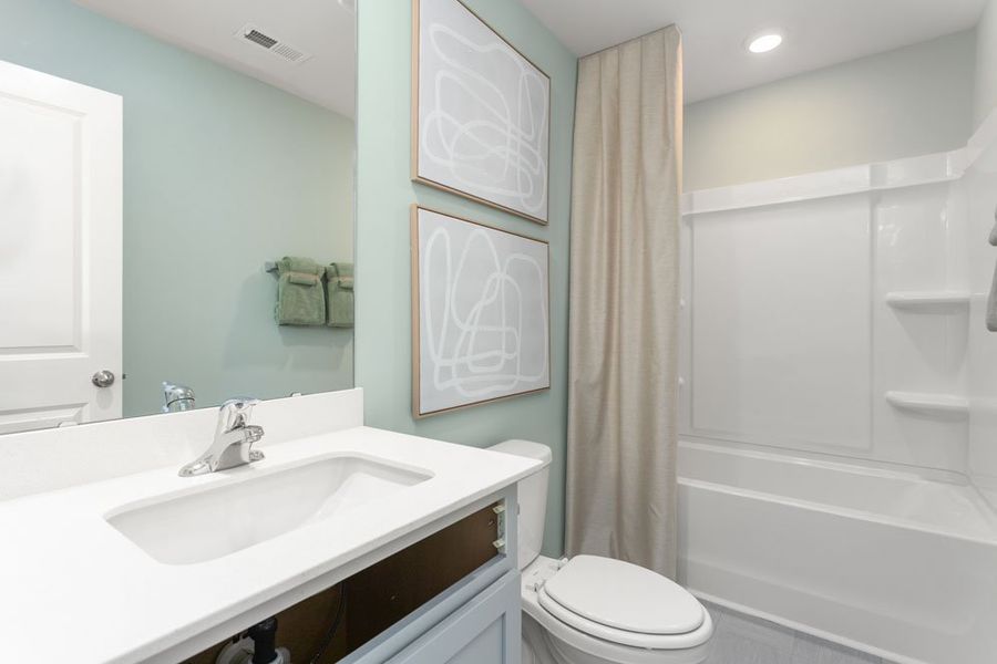 Furnished interior in a model home at Cedar Oaks in Greensboro (Image 18).