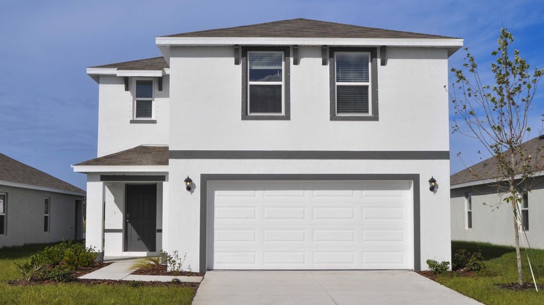 Front exterior of a home in the Oakfield Trails community, located in Parrish, FL (Image 8).