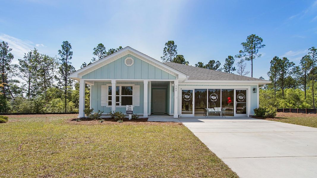 Front exterior of a home in the Ashton Park Phase III community, located in Freeport, FL (Image 3).