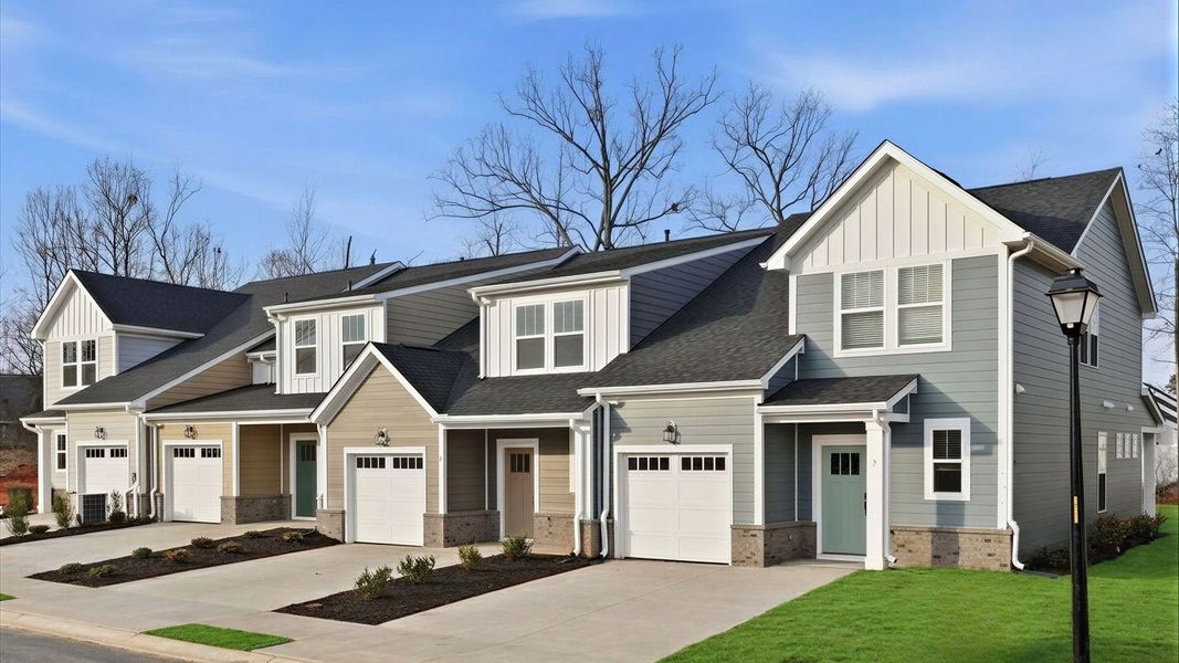 Front exterior of a home in the Pelham Crossing Villas community, located in Greenville, SC (Image 10).