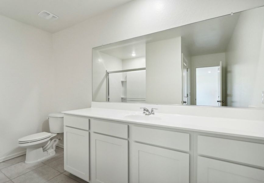 Furnished interior in a model home at Agave Trails in Buckeye (Image 25).