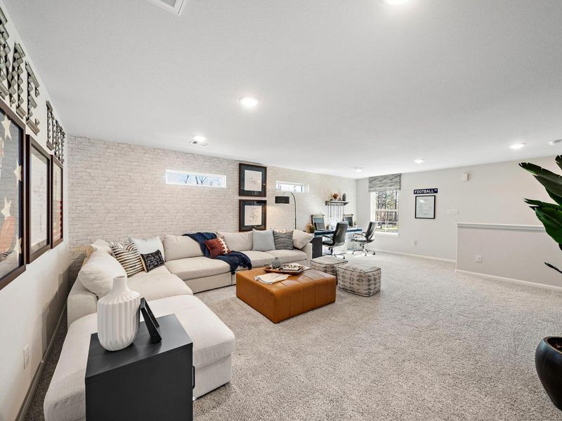 Furnished interior in a model home at Lakes at Black Oak in Magnolia (Image 28).