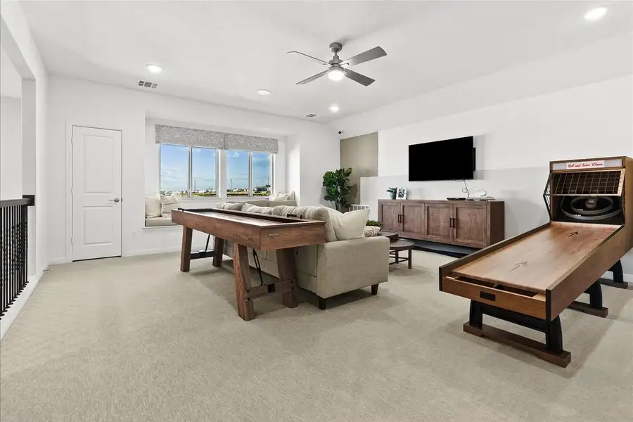 Furnished interior in a model home at Creekview Meadows in Pilot Point (Image 7).