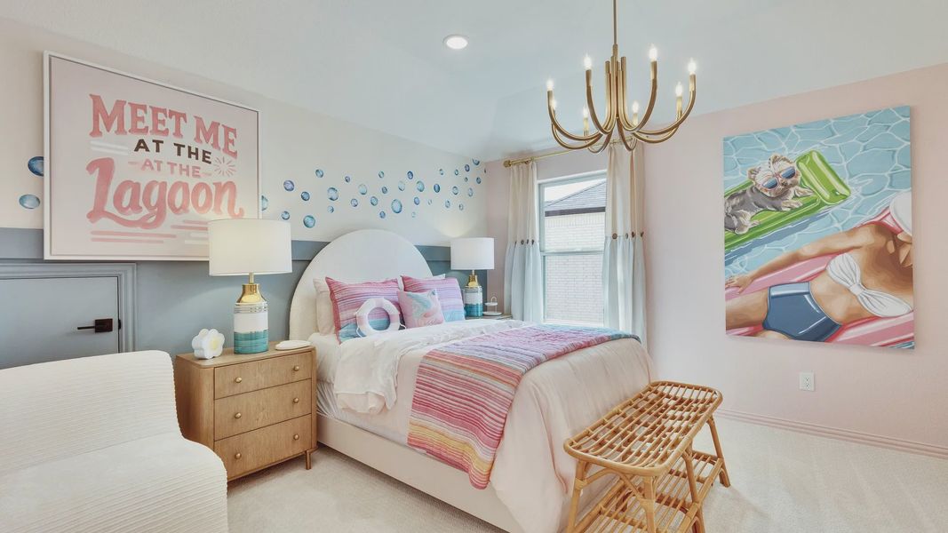 Luxurious bedroom featuring pastel hues, elegant chandelier, custom art in Sunfield community. Luxurious bedroom featuring pastel hues, elegant chandelier, custom art in Sunfield community.