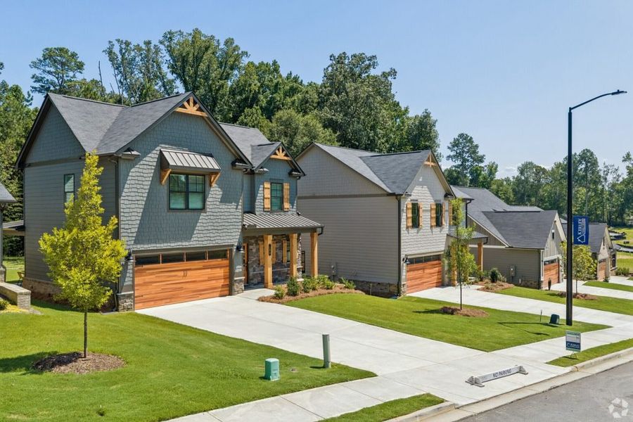 Front exterior of a home in the Meadow Pines community, located in Dallas, GA (Image 13).