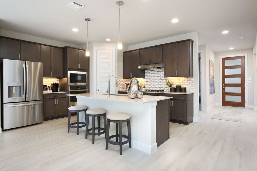 Furnished interior in a model home at Cloverleaf in Austin (Image 75).