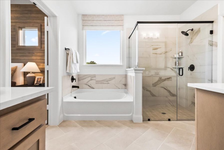 Furnished interior in a model home at The Reserve at Spiritas Ranch in Little Elm (Image 25).