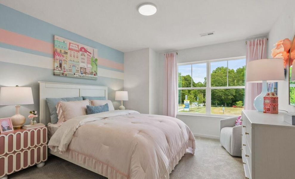 Furnished interior in a model home at CraigStone in Woodruff (Image 12).