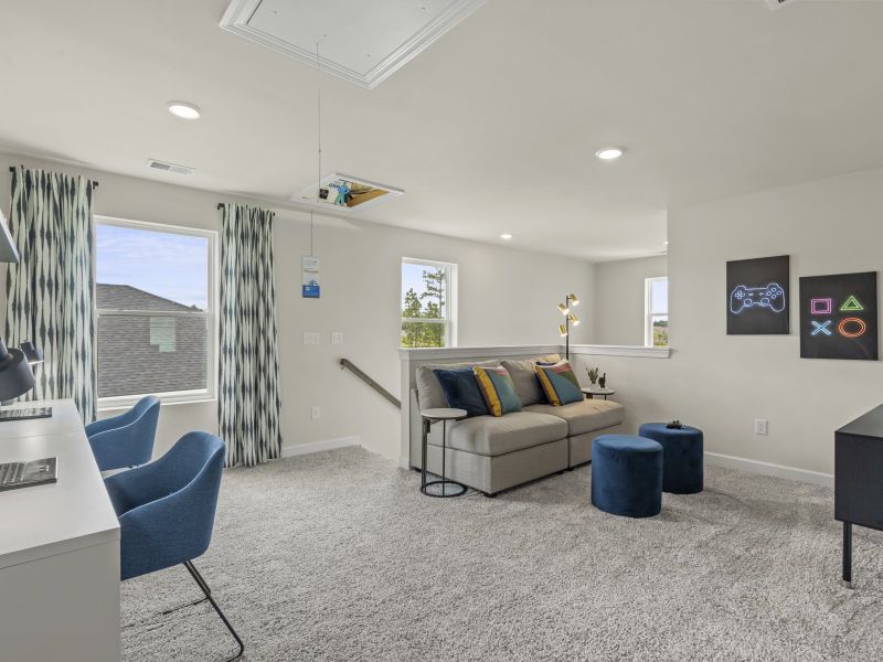 A second floor loft provides a large space to relax and unwind.