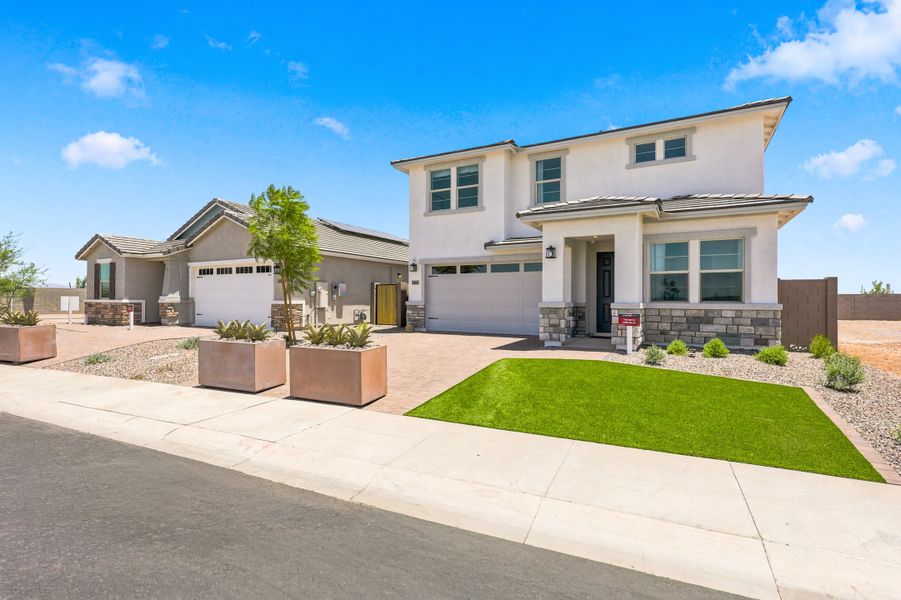 Front exterior of a home in the Willows at Bella Vista Farms community, located in San Tan Valley, AZ (Image 3).
