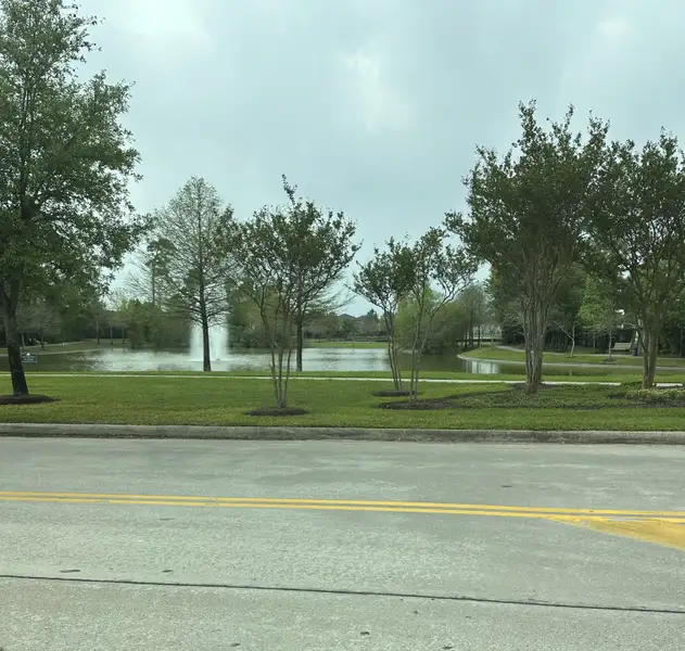 A serene park with a pond and trees in Forest Village by Long Lake Ltd. (Spring, TX). Perfect for nature lovers. A serene park with a pond and trees in Forest Village by Long Lake Ltd. (Spring, TX). Perfect for nature lovers.