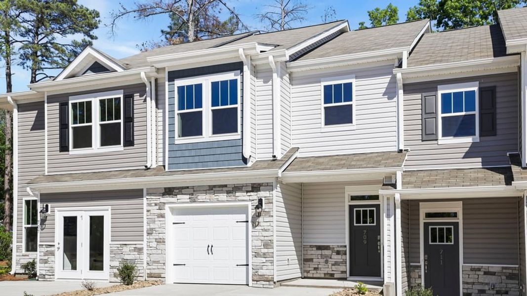 Front exterior of a home in the Ken's Crossing community, located in Moore, SC (Image 2). Front exterior of a home in the Ken's Crossing community, located in Moore, SC (Image 2).