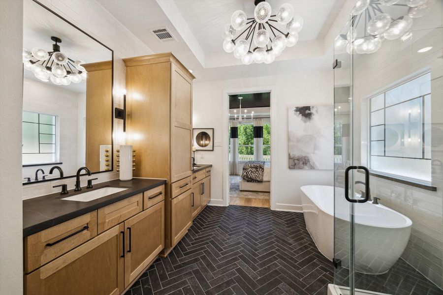 Furnished interior in a model home at ARTAVIA® - 40' in Conroe (Image 37).