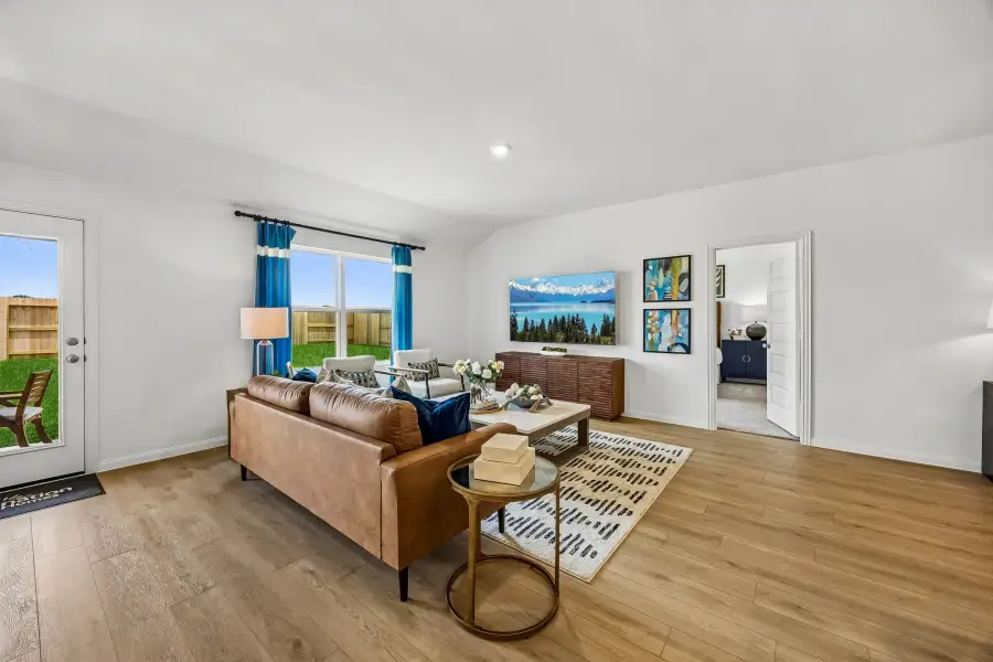 Furnished interior in a model home at The Canopies in Splendora (Image 8).