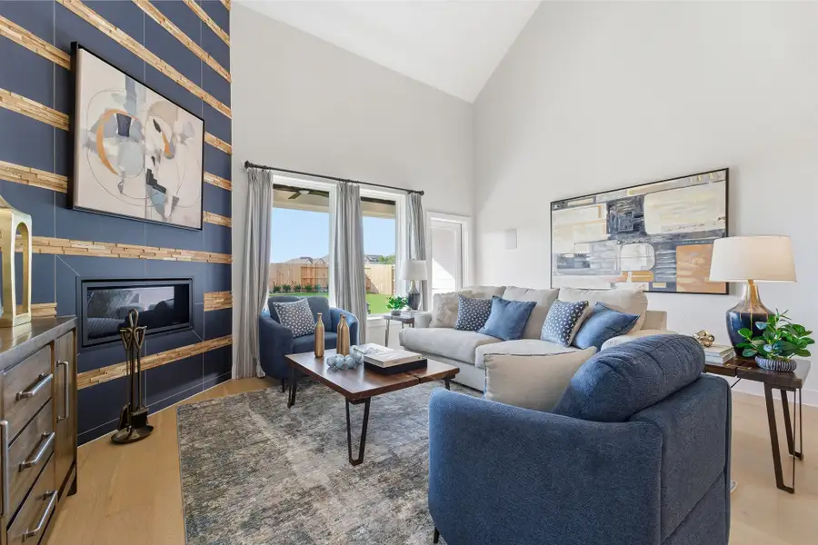 Furnished interior in a model home at Wildrye in Waller (Image 39).