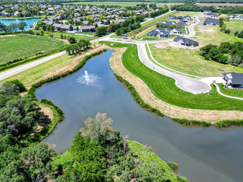 Aerial view of the The Courtyards at Jacobs Farm community in Wichita, KS, showing layout and nearby surroundings (Image 9). Aerial view of the The Courtyards at Jacobs Farm community in Wichita, KS, showing layout and nearby surroundings (Image 9).